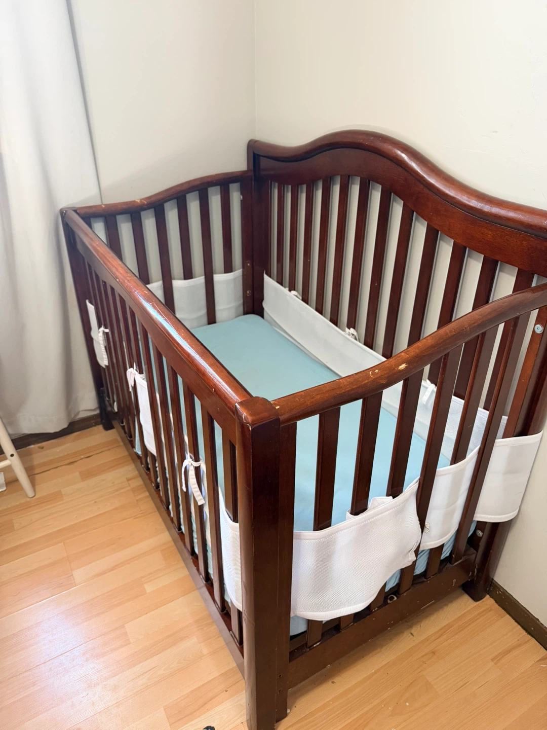 Wooden Baby Crib with Changing Station and Baskets - photo 2