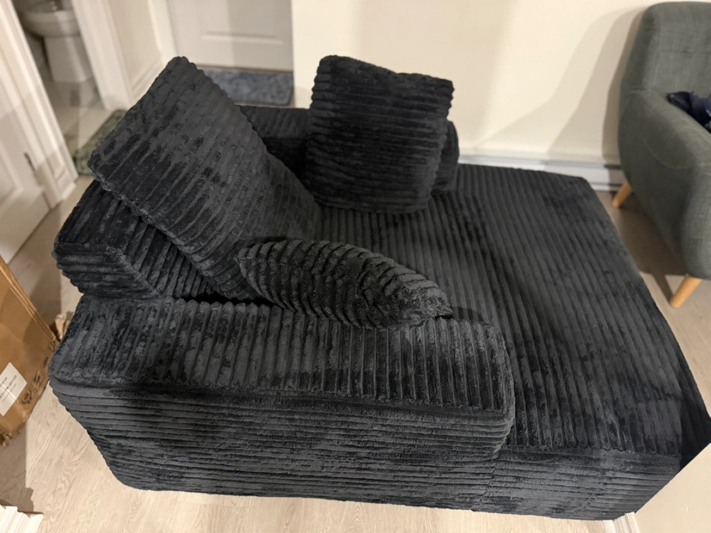 Black Corduroy Sofa Bed with Pillows