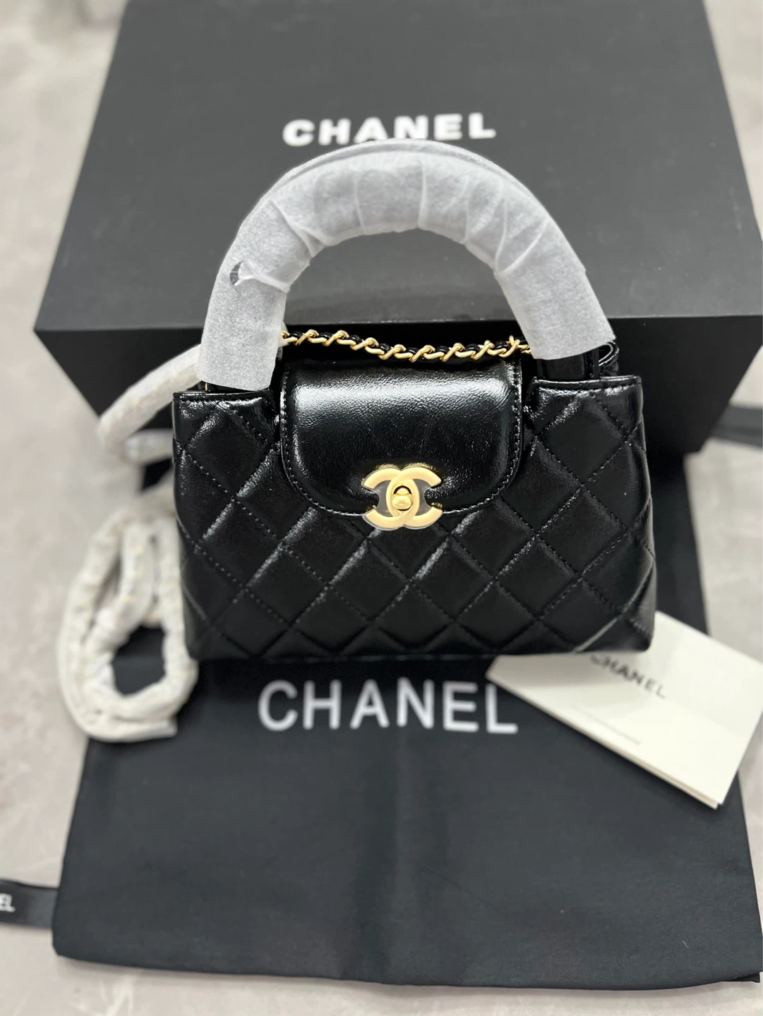 CHANEL Small Black Quilted Handbag with Top Handle