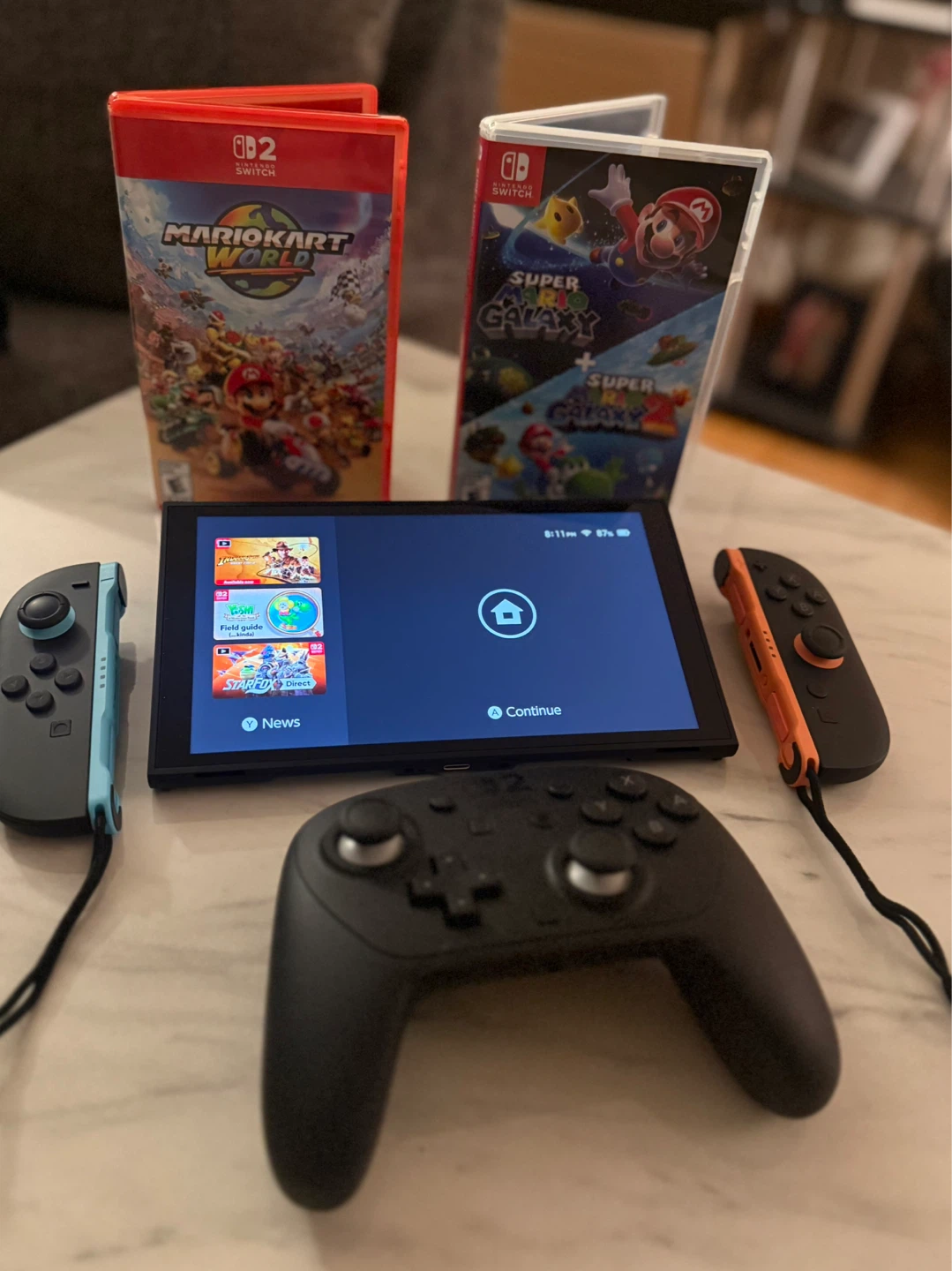 Nintendo Switch with Mario Kart World and Super Mario Galaxy