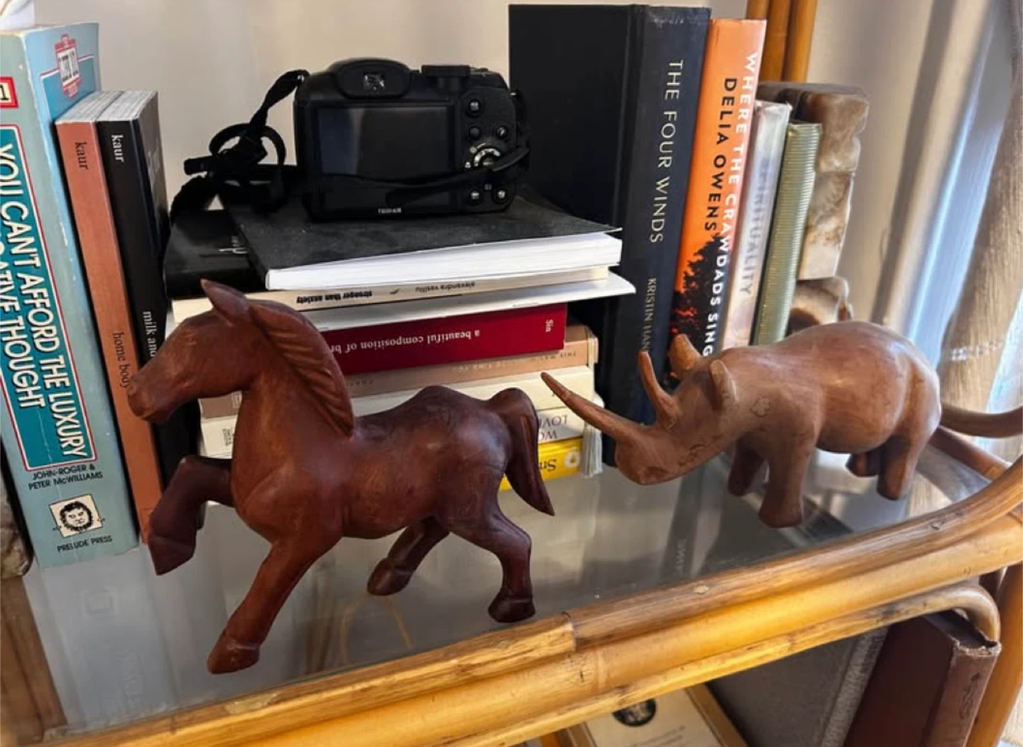 Carved wooden rhinoceros figurine