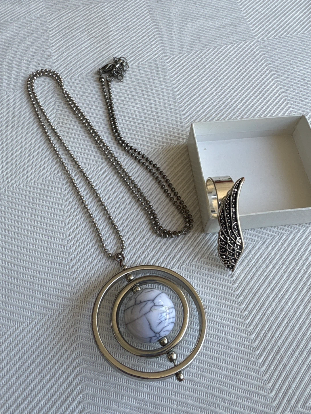 Silver tone pendant necklace and ring set