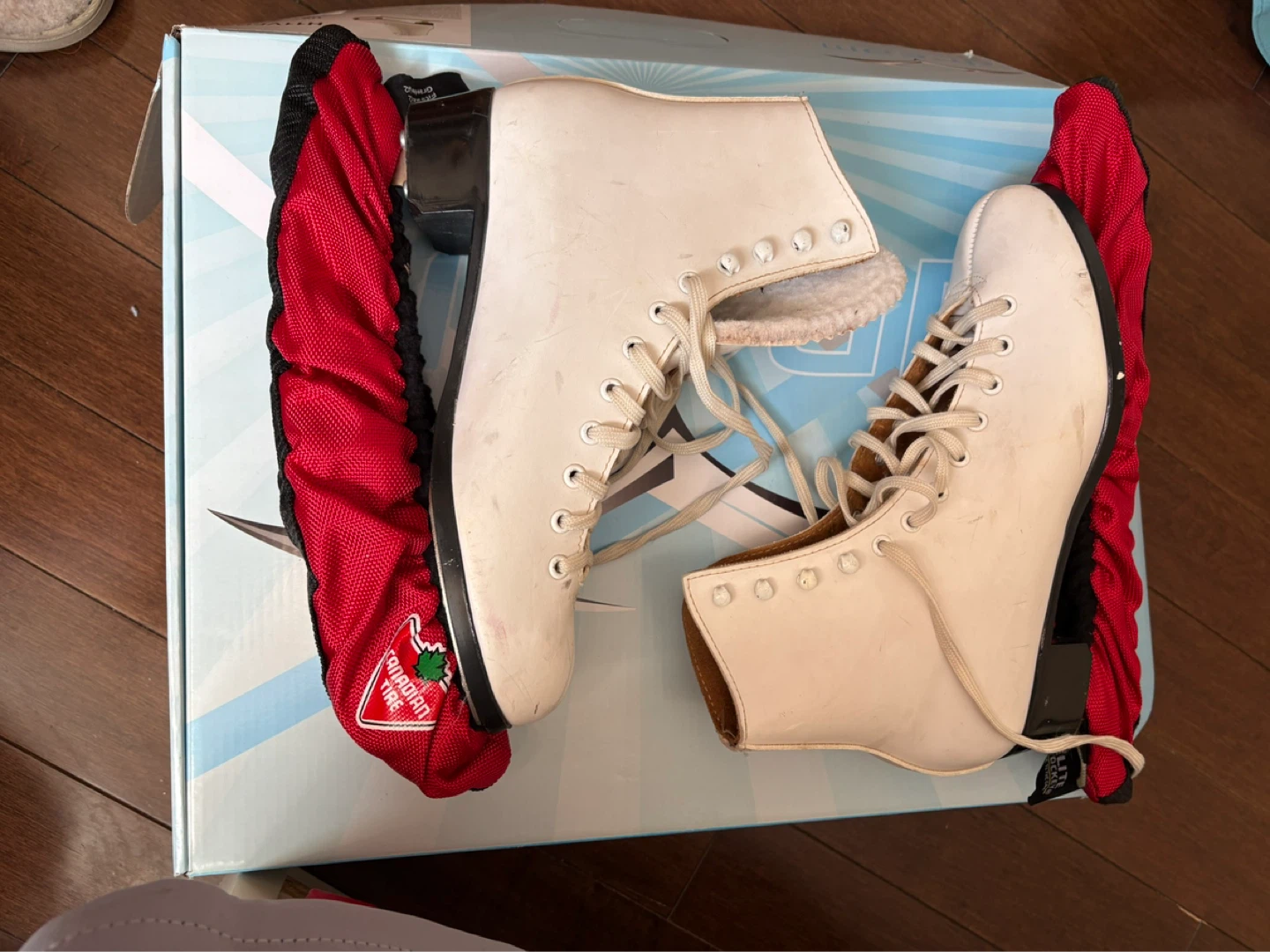 White Figure Skates with Canadian Tire Blade Covers