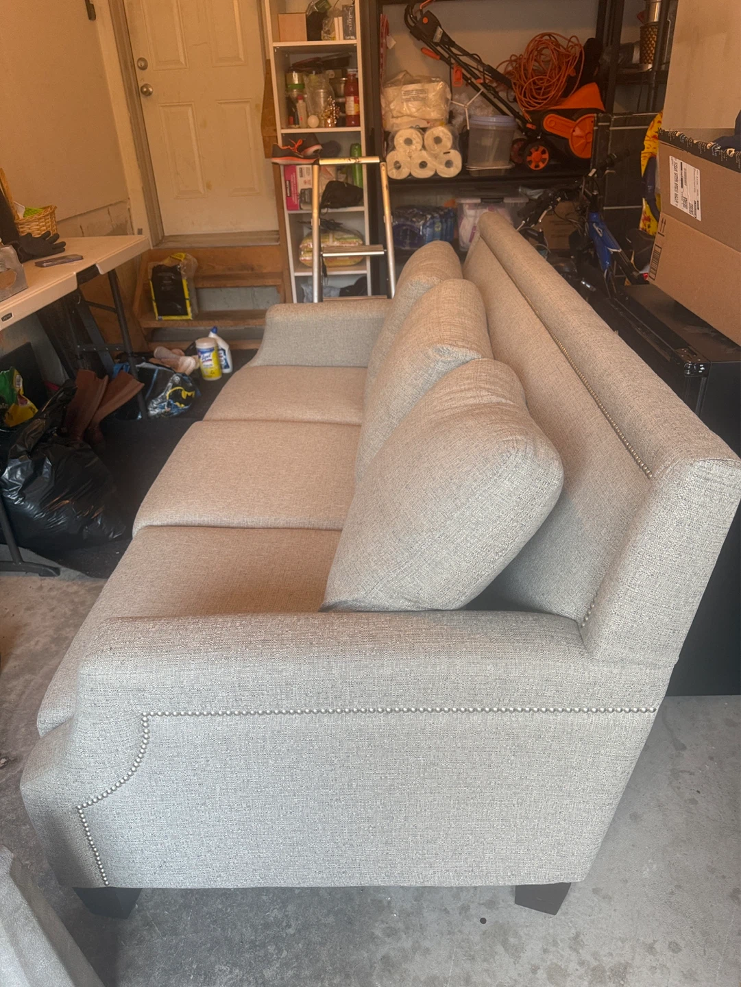 Three-seater couch with decorative studs - photo 3