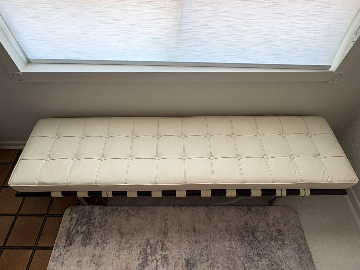 White Tufted Bench with Black and White Striped Upholstery