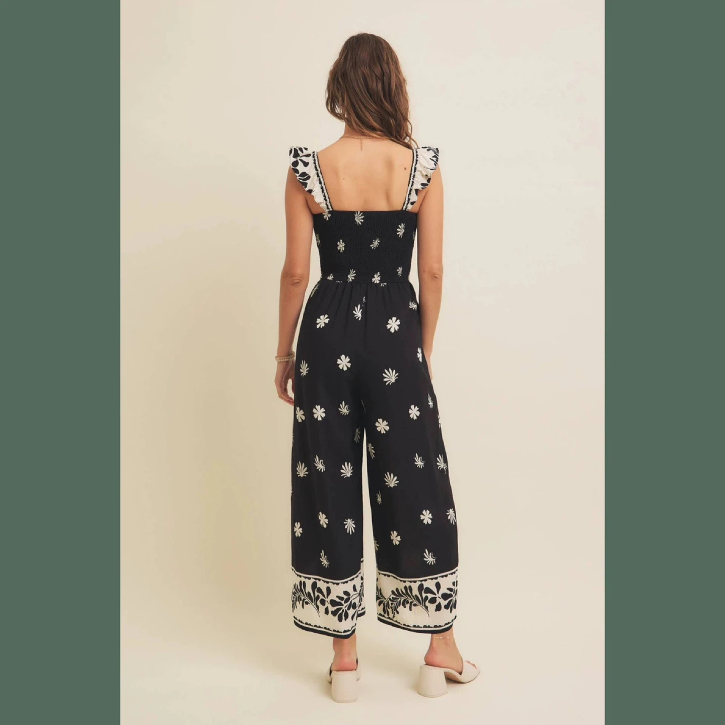 Black floral smocked jumpsuit - photo 2