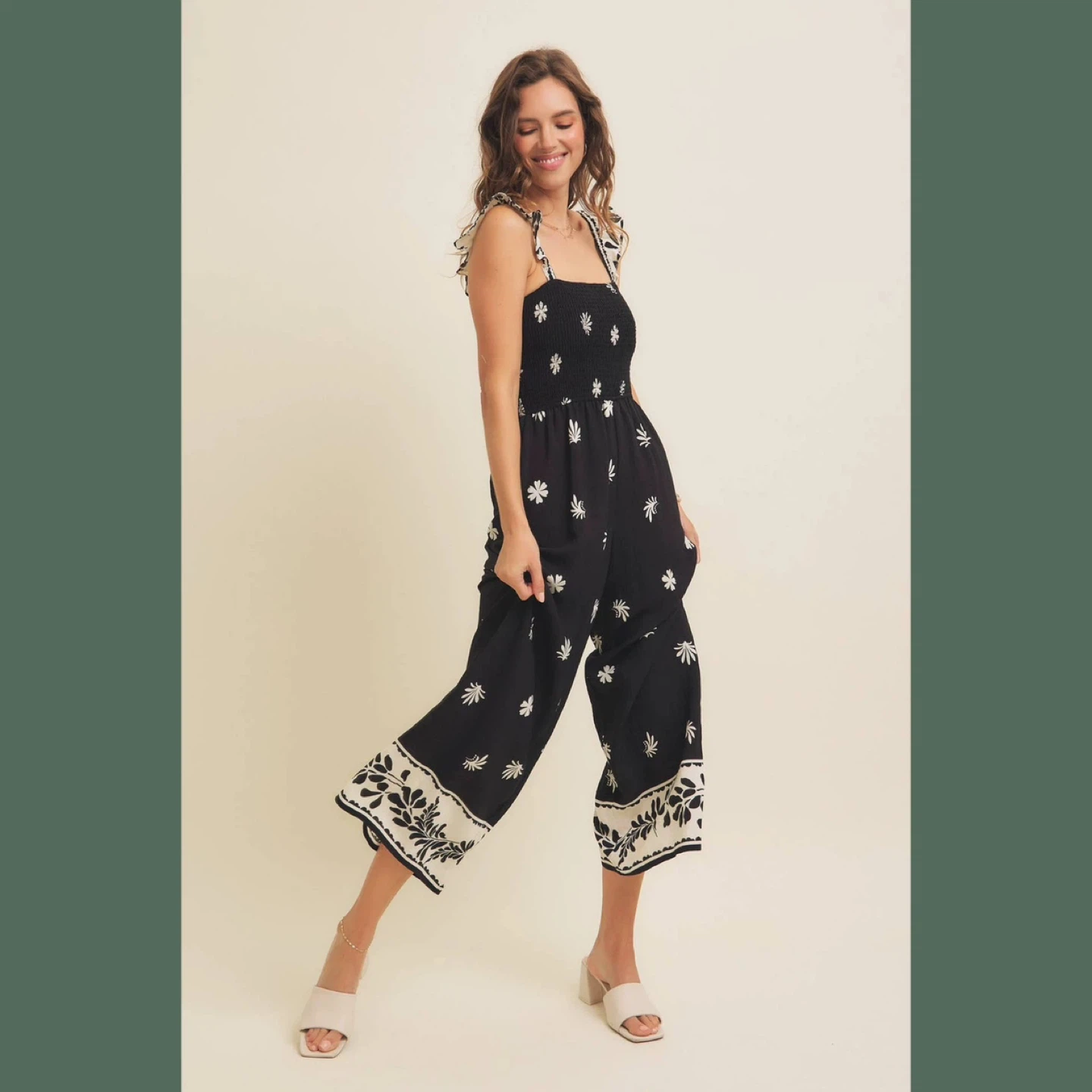 Black floral smocked jumpsuit