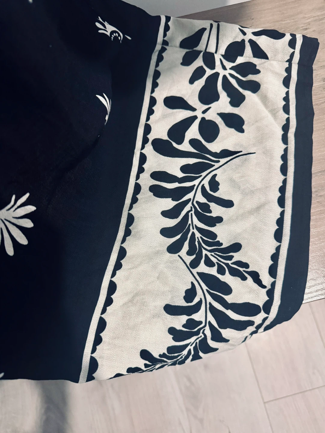 Black floral smocked jumpsuit - photo 5