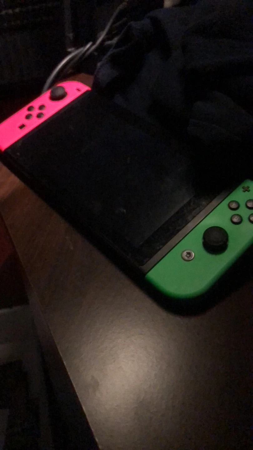 Nintendo Switch Console with Neon Pink and Green Joy-Cons