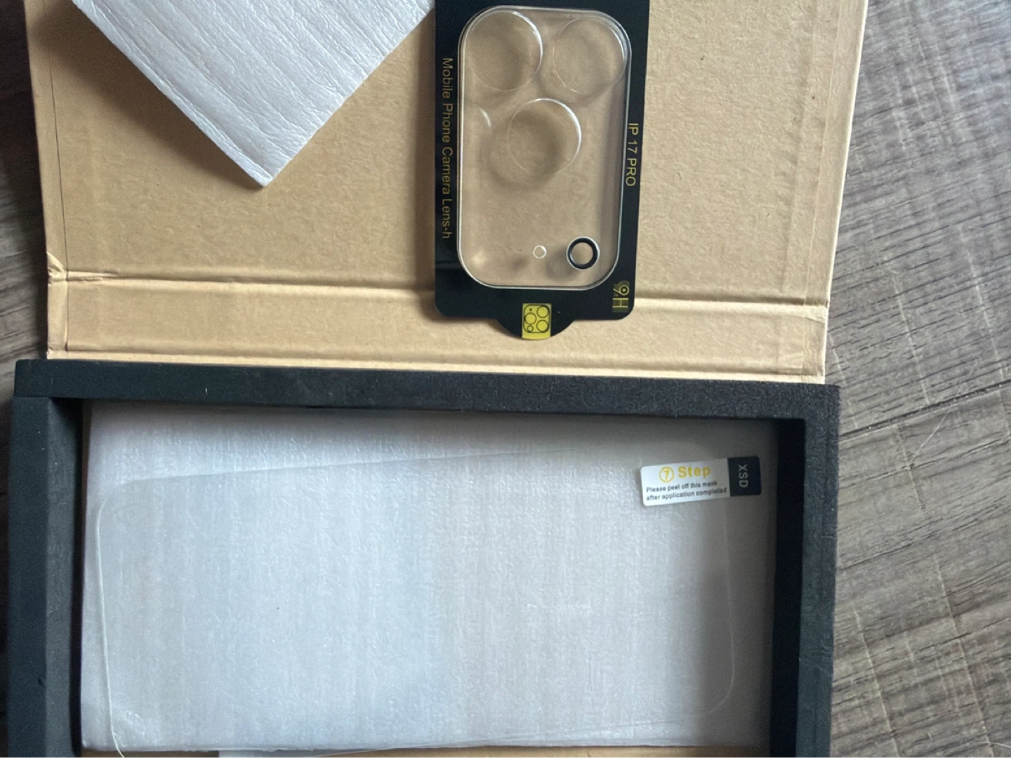 Tempered “glass” screen x1 and camera cover x2