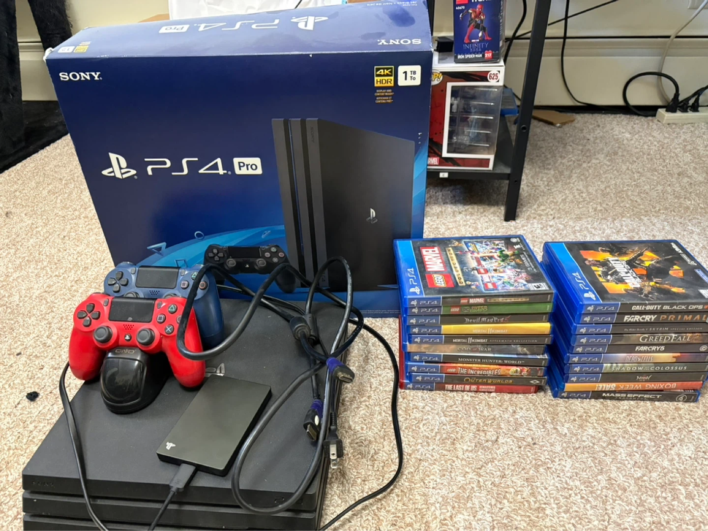 Sony PlayStation 4 Pro 1TB Console with Games and Accessories - photo 2
