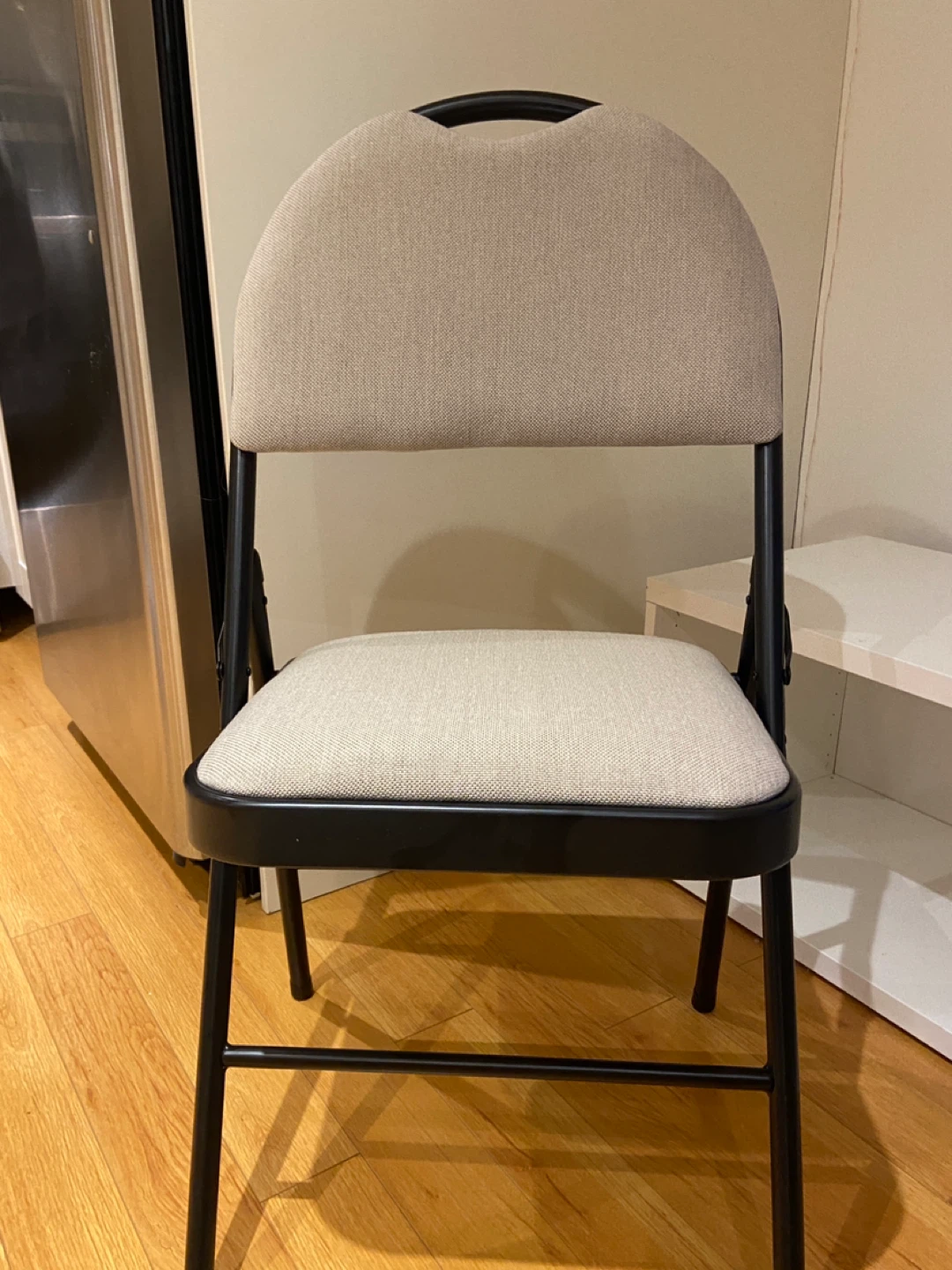 Two Folding Chairs with Padded Seats and Backs