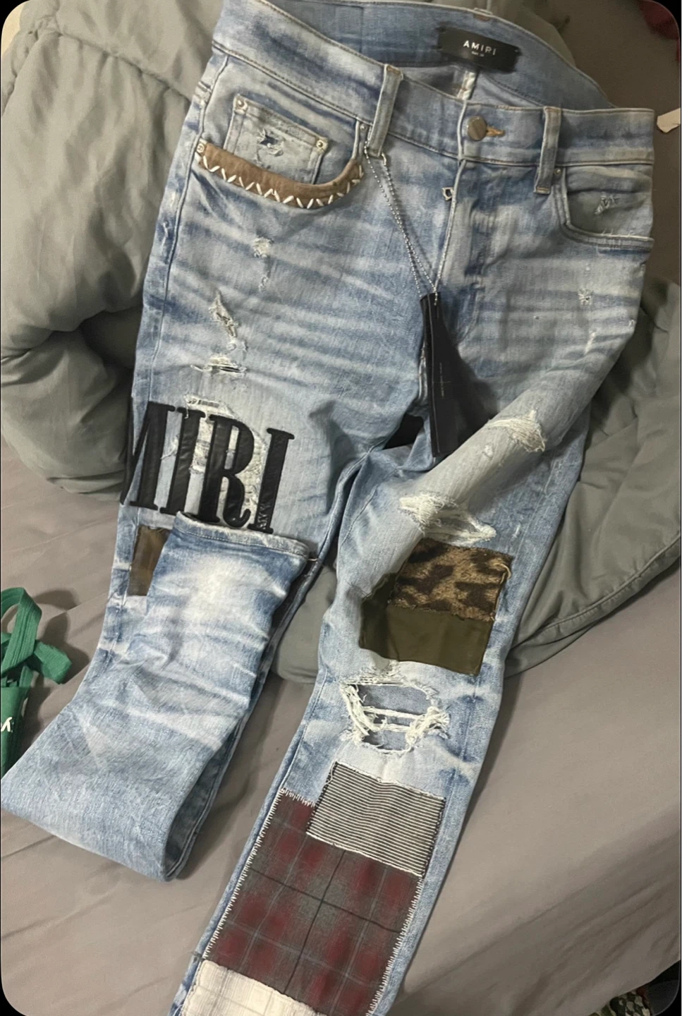 Amiri Grunge Patch Jeans