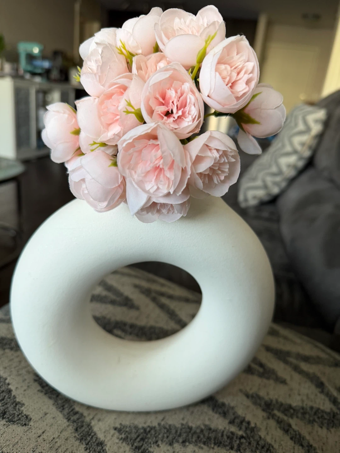 White Doughnut Vase with Pink Flowers