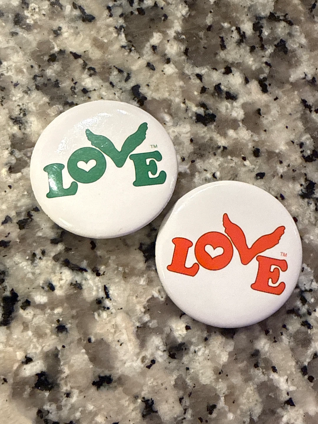 Two Coldplay Concert "LOVE" Pins - Green and Orange