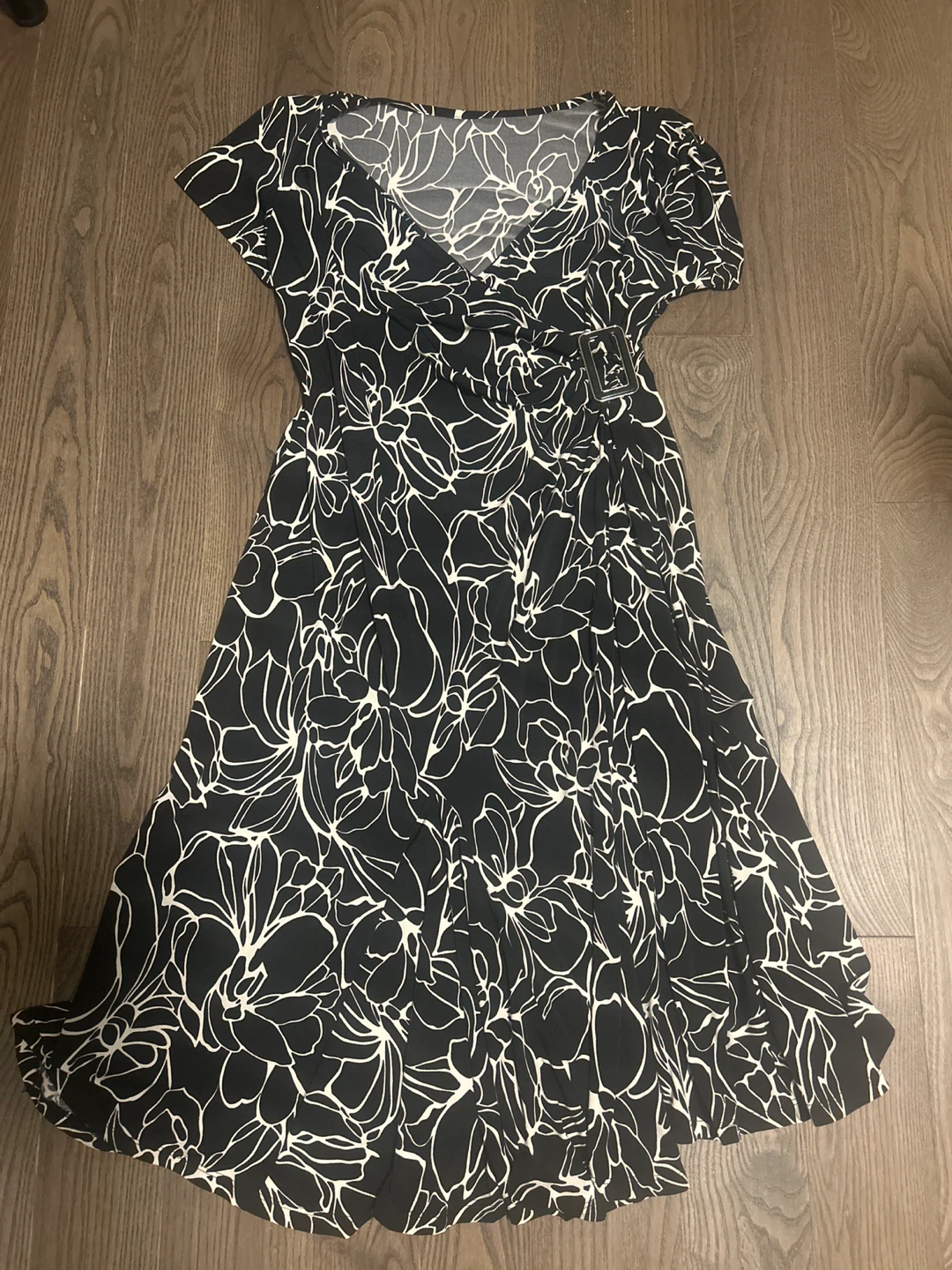 Black and white floral dress with buckle accent