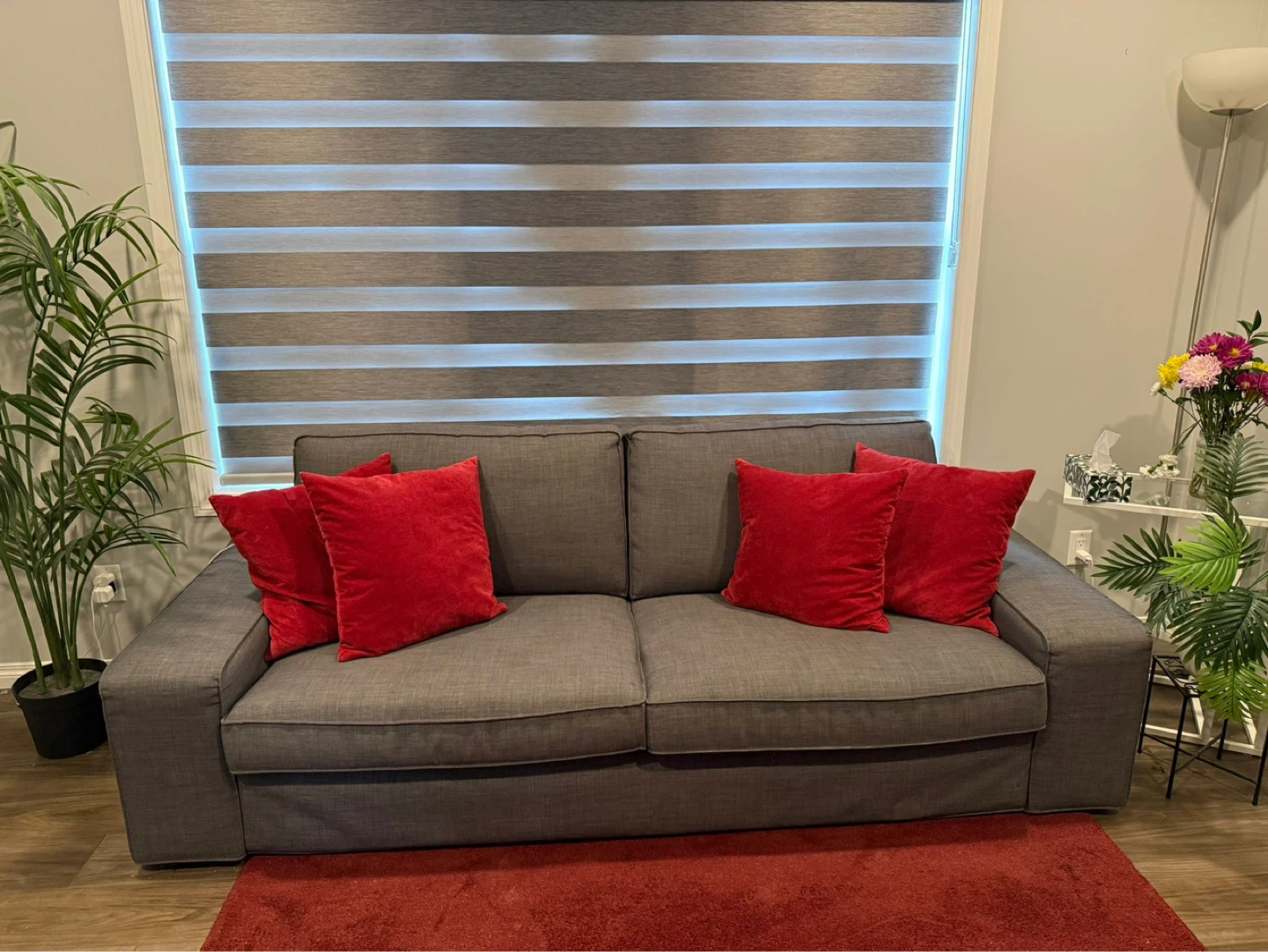 Grey Sofa with Red Pillows