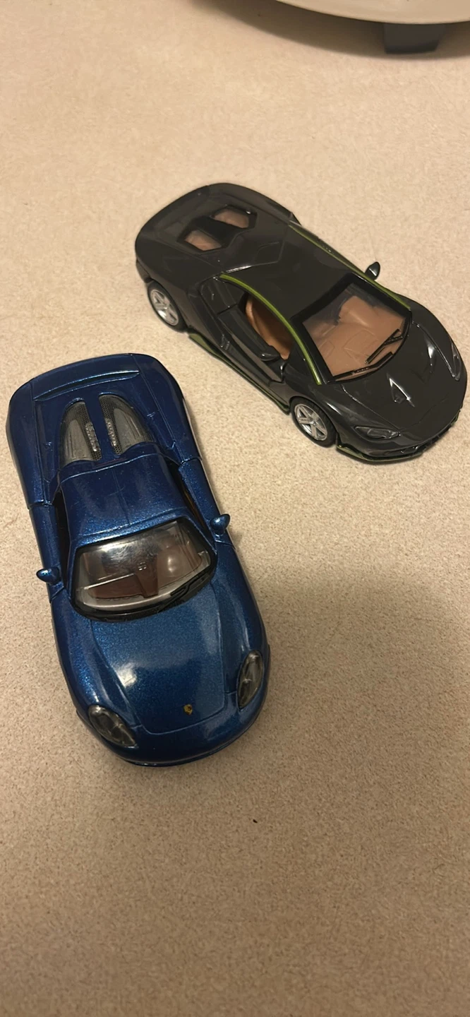 2 Diecast Toy Cars - Blue Sports Car and Black Sports Car
