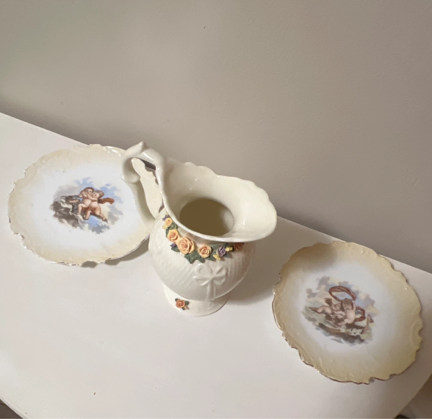 Cherub Pitcher and Saucers Set
