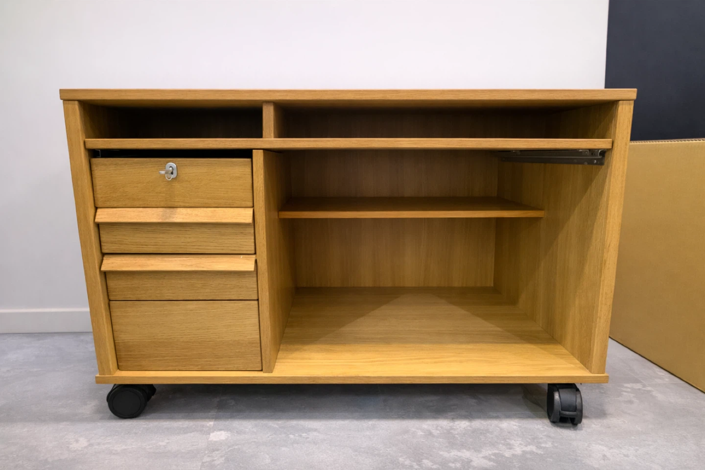Wooden cabinet with drawers and wheels
