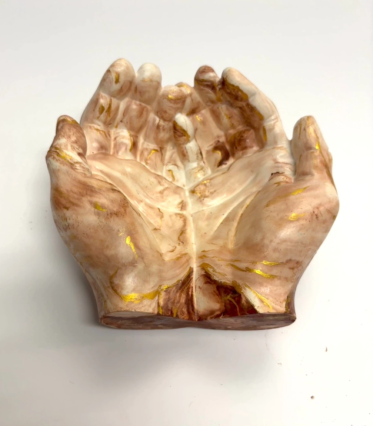 Hands cupped sculpture brown marble with gold