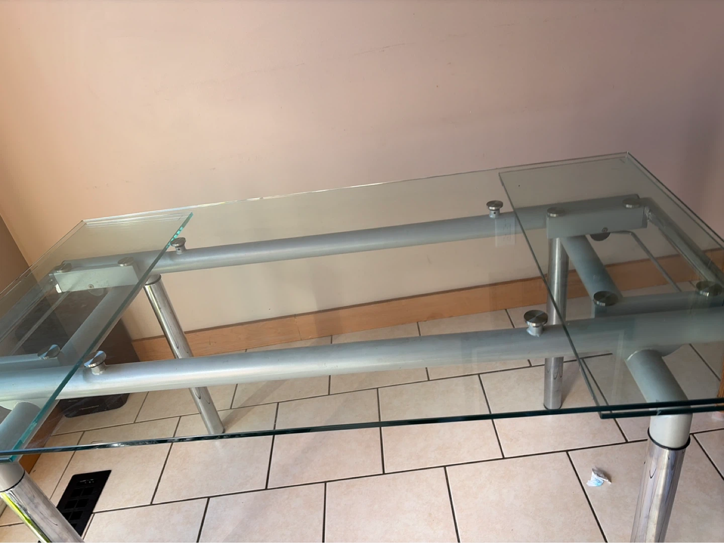Glass top table with metal frame