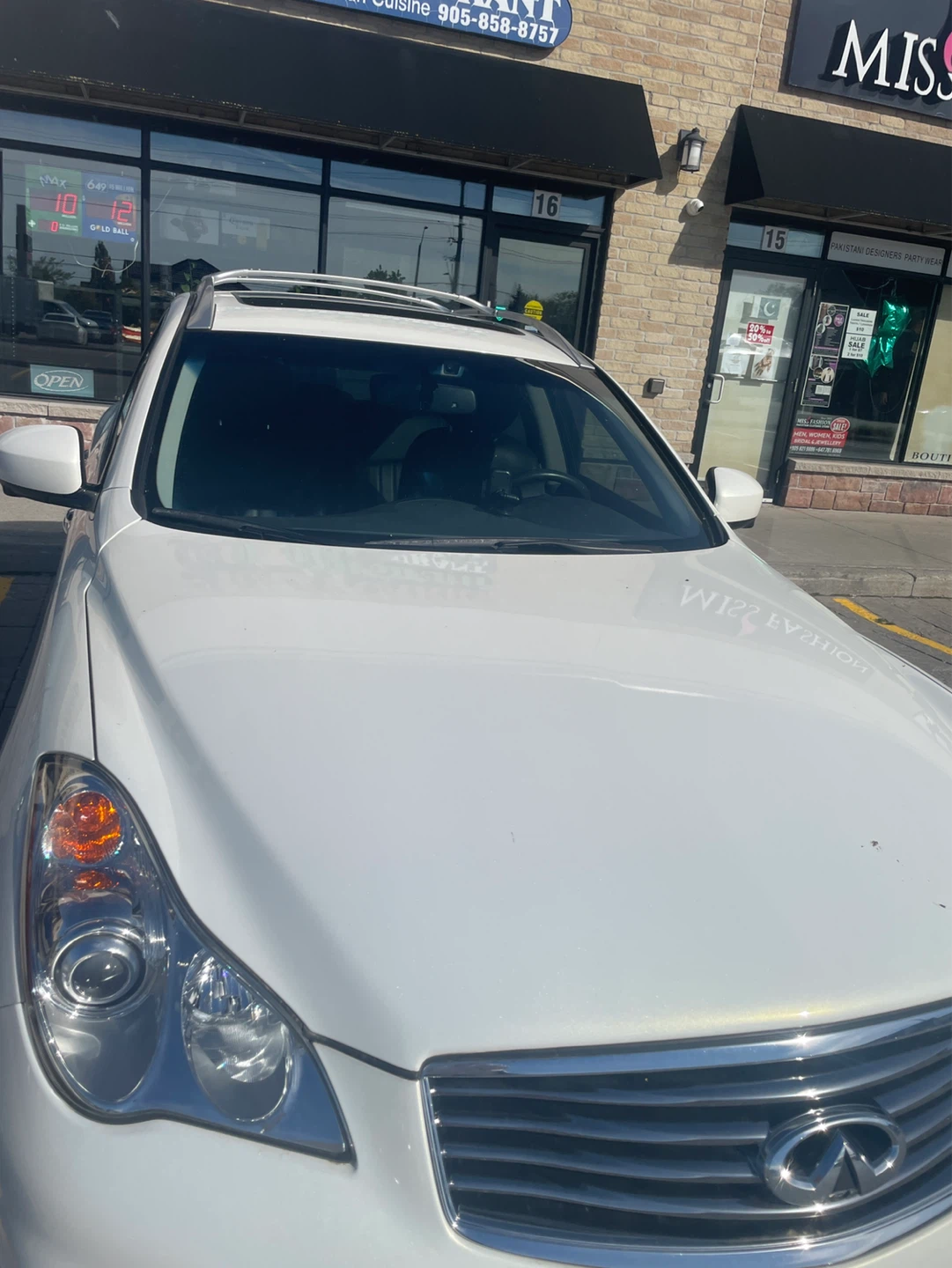 Pearl White Infiniti QX50 year 2015 AWD woman driven - photo 3