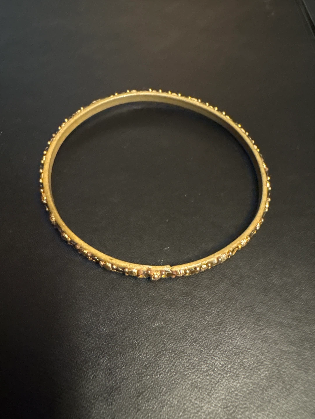 Gold Tone Bangle Bracelet with Embellishments