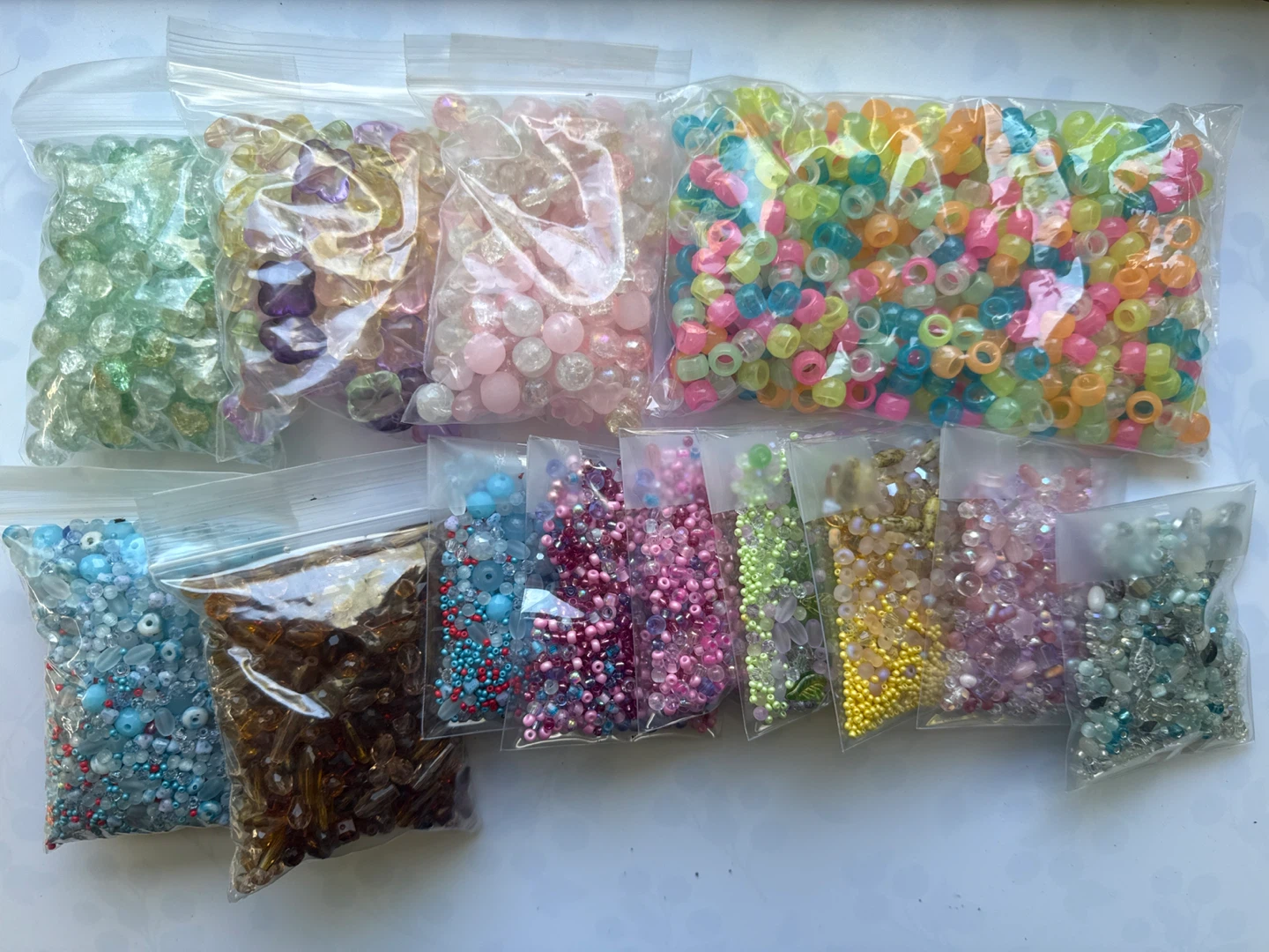 Assorted beads for jewellery making + trays and string!