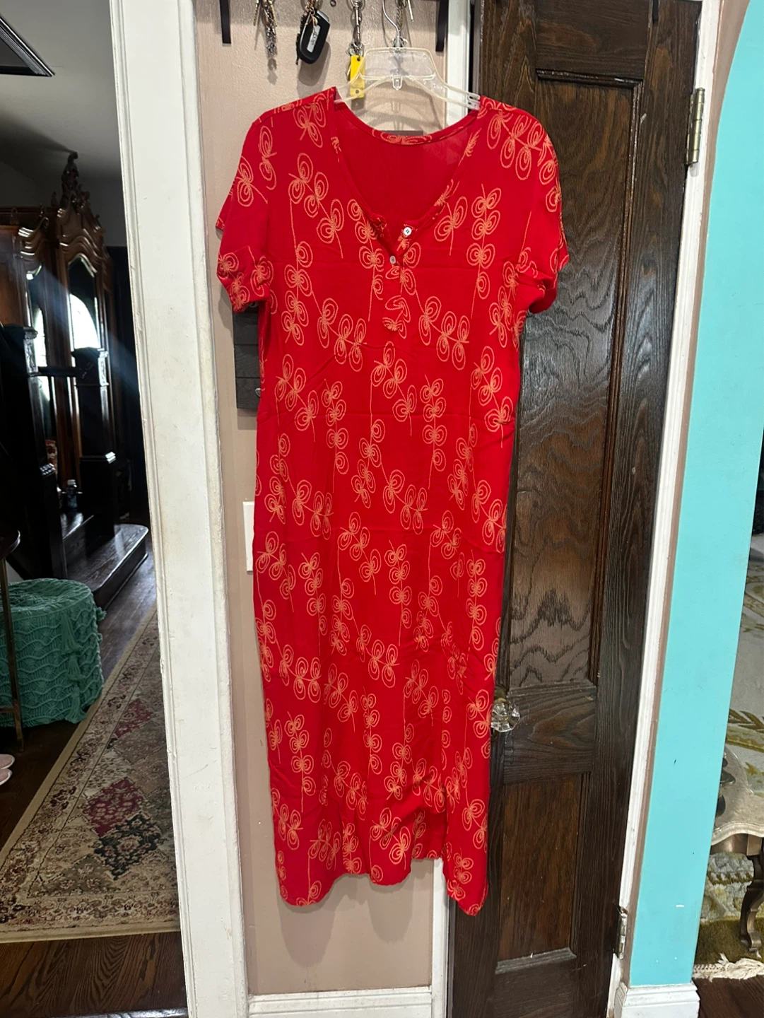 Red maxi dress with butterfly pattern