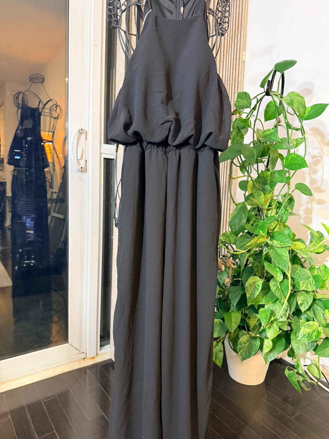 Black halter neck padded jumpsuit