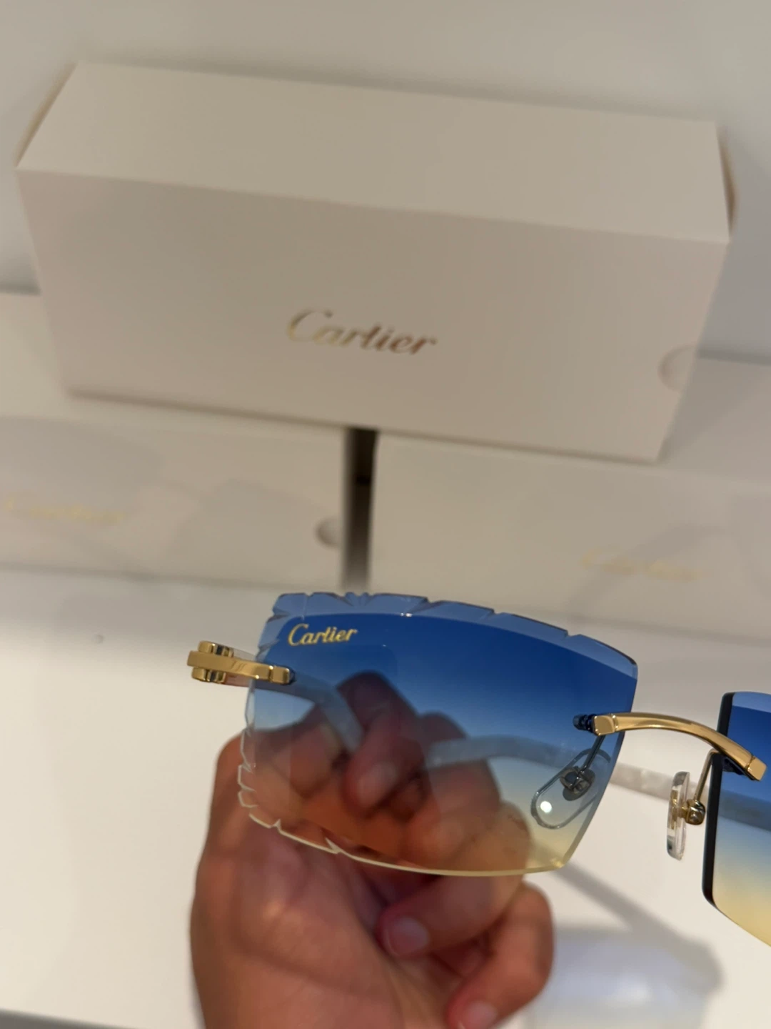 Cartier Rimless Sunglasses with Blue Gradient Lenses