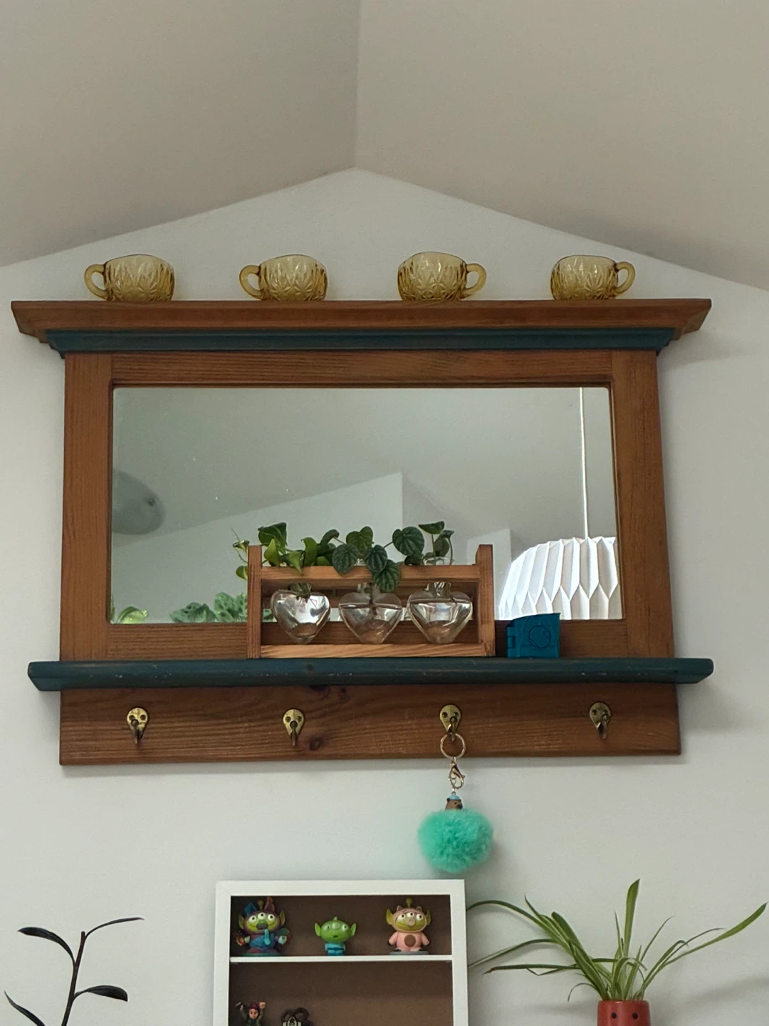 Mirror shelf with hangers