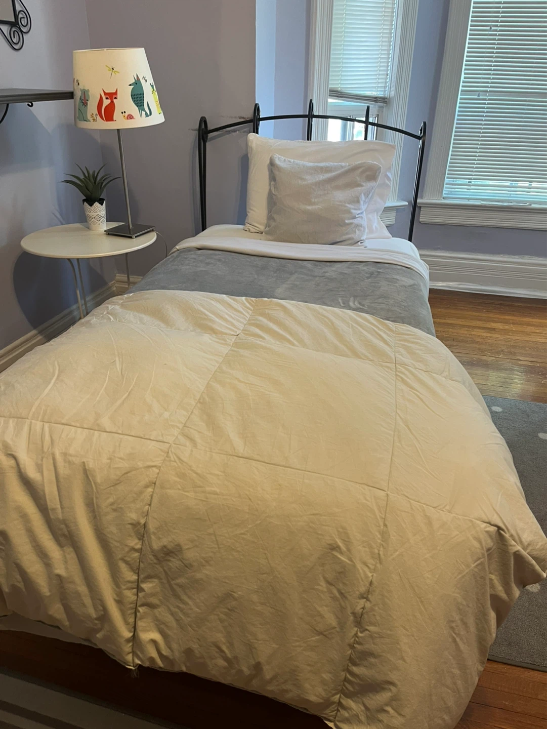 Single Bed Frame with Decorative Lamp and Pillow