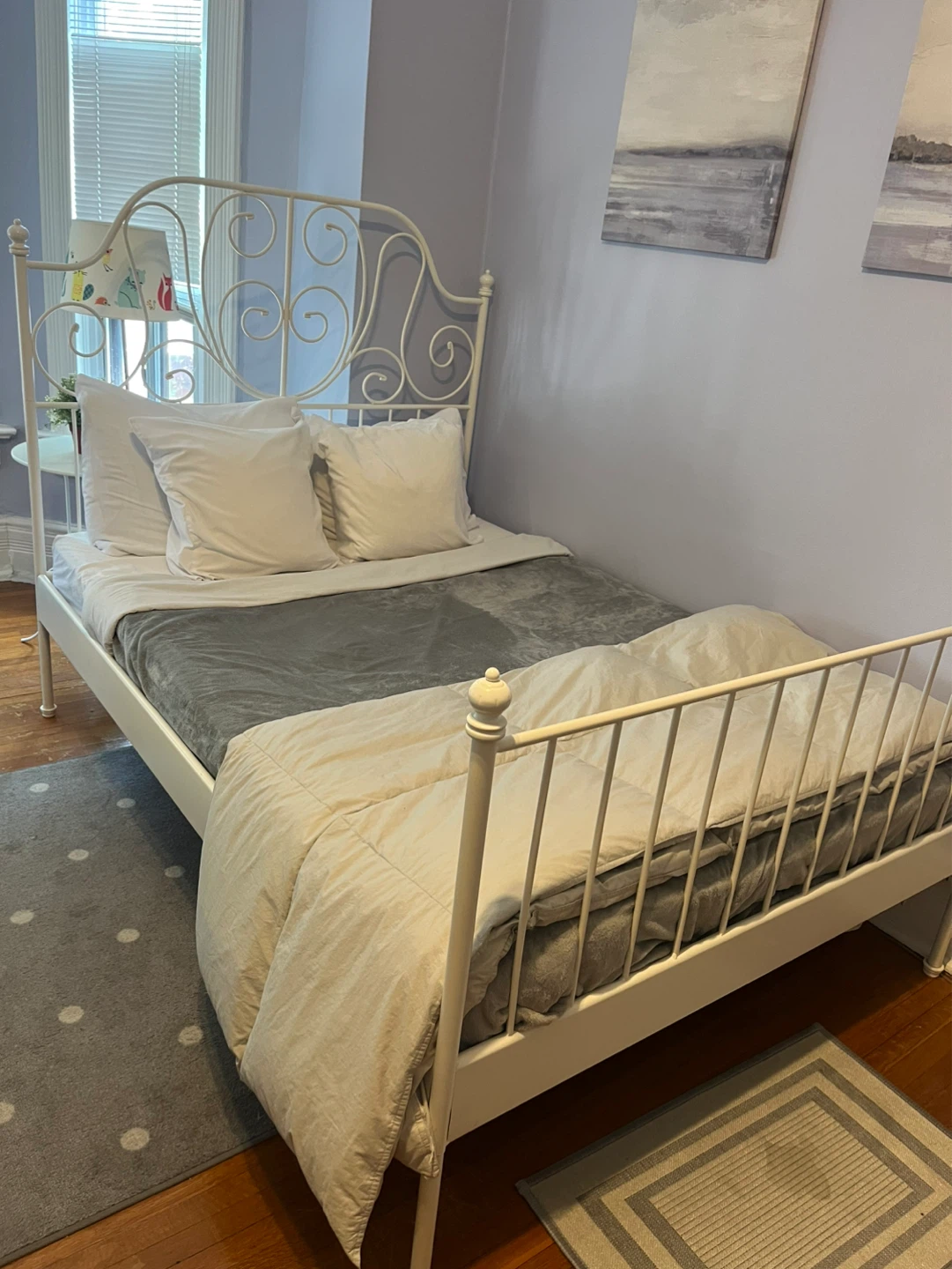 Double bed with flame and side table