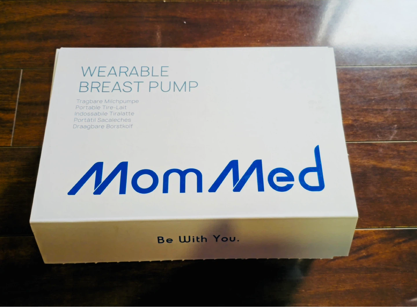 MomMed Wearable Pump and Evenflo manual pump