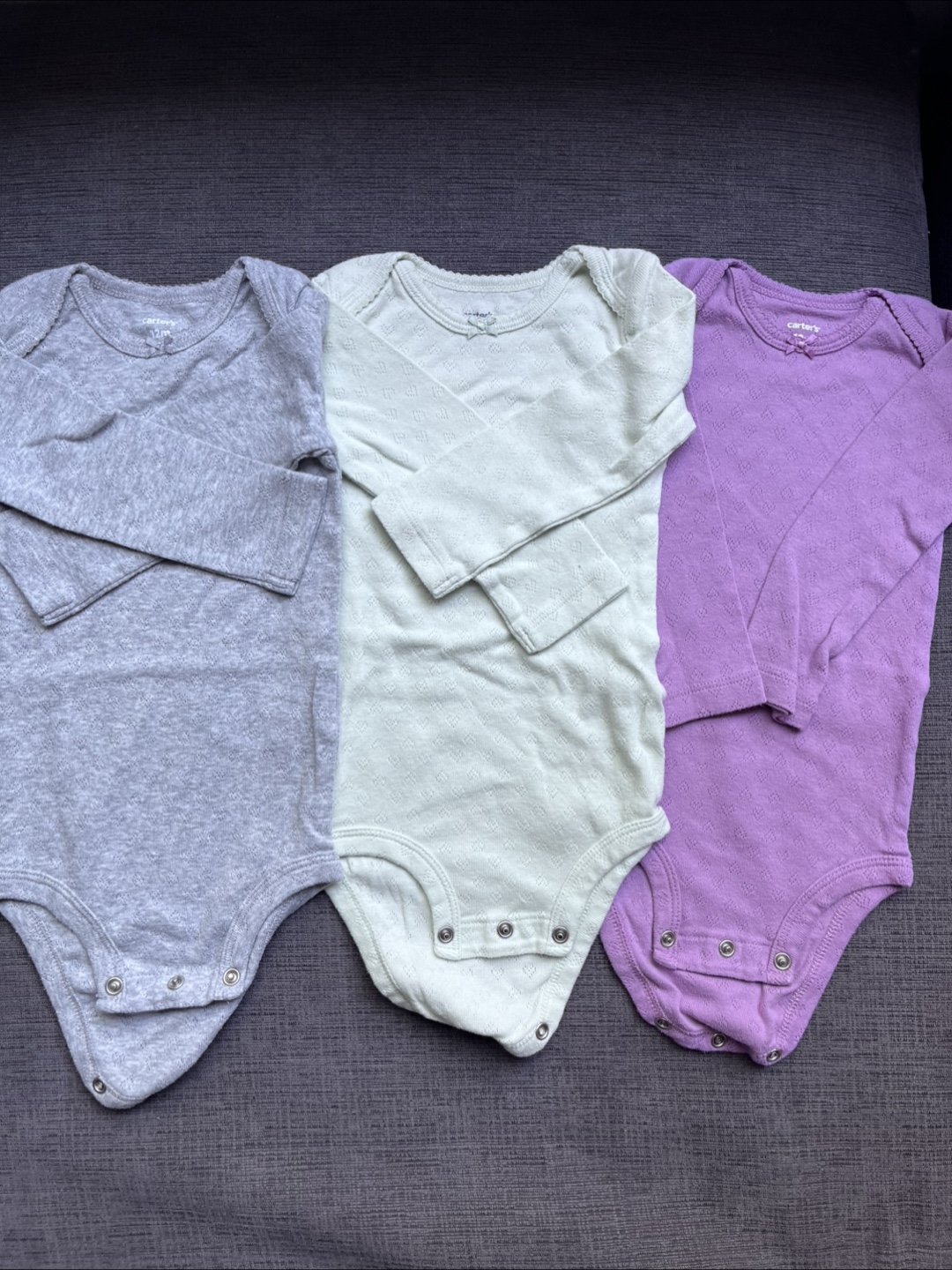 New Carter’s 12 month long sleeve bodysuits