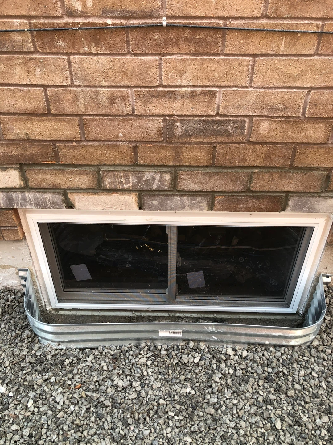 Basement Side Entrance Door and Window Well Installation - photo 3