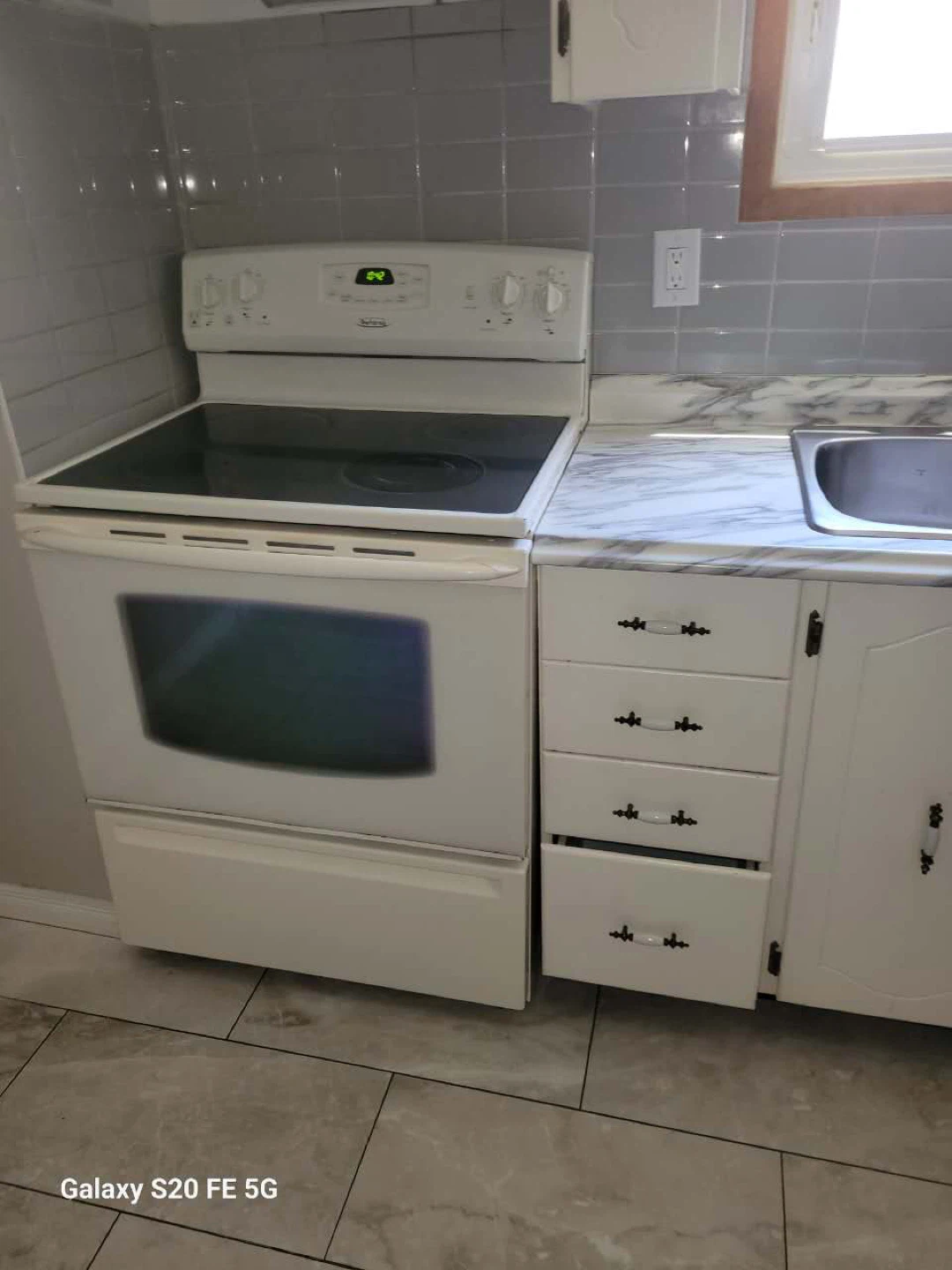 White Electric Stove with Glass Top