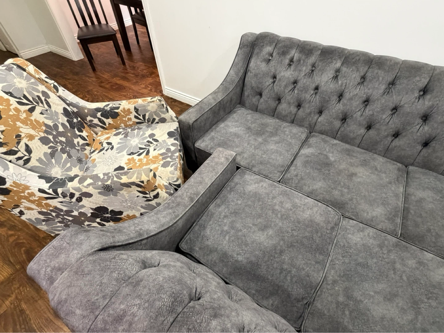 Grey Tufted Sofa and Glass Coffee Tables