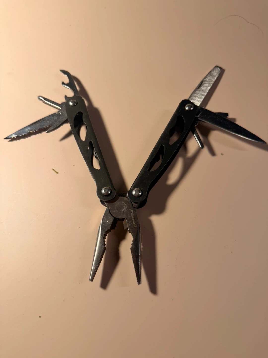Multi-tool with Pliers, Knife, and File - photo 3