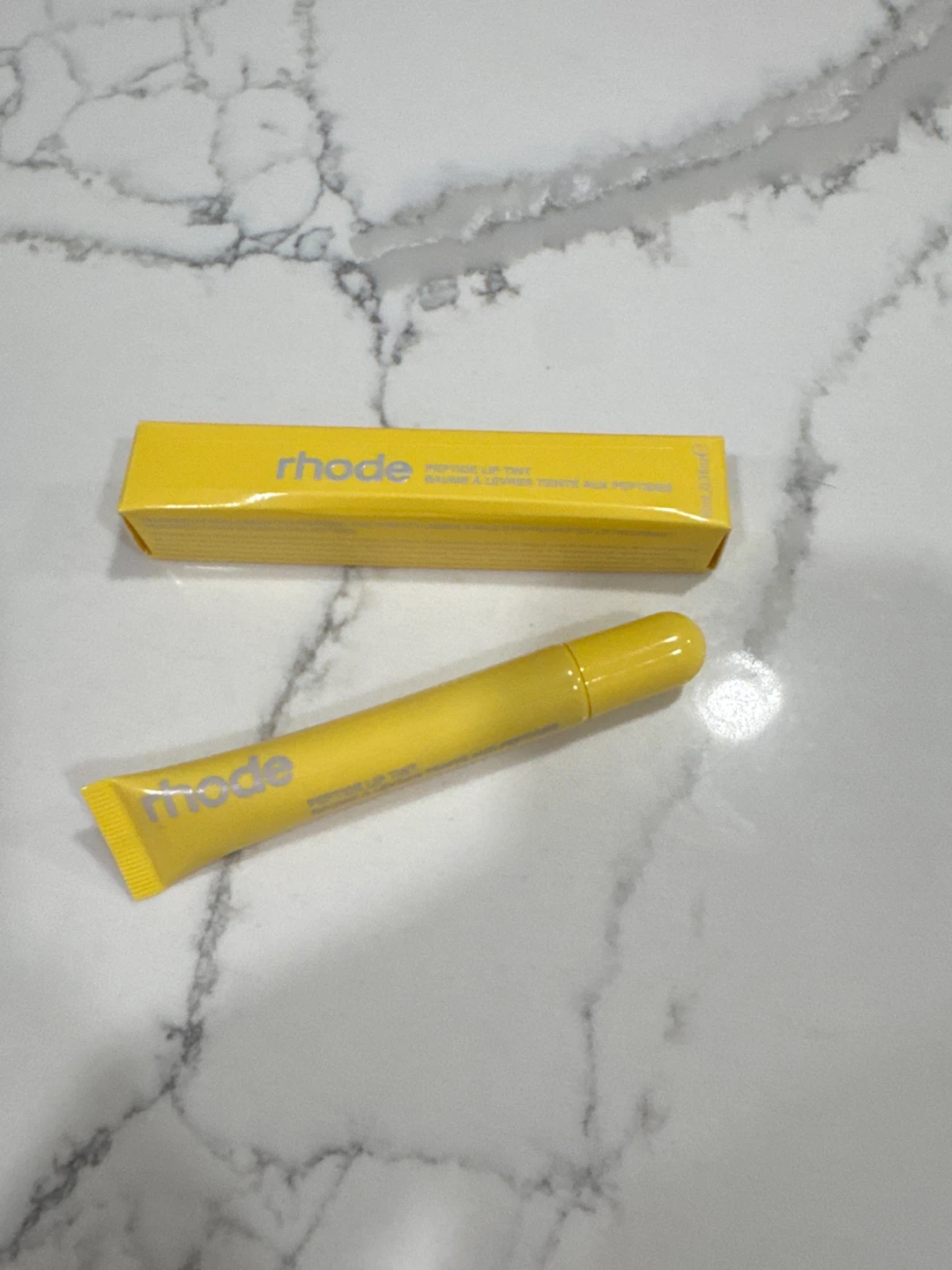 Rhode Peptide Lip Tint in a Yellow Phone Case - photo 4