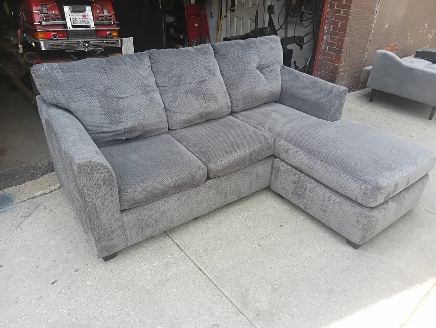 Grey L  couch with delivery