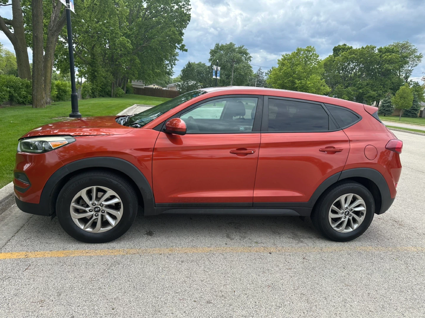 Orange Hyundai Tucson SUV - photo 3