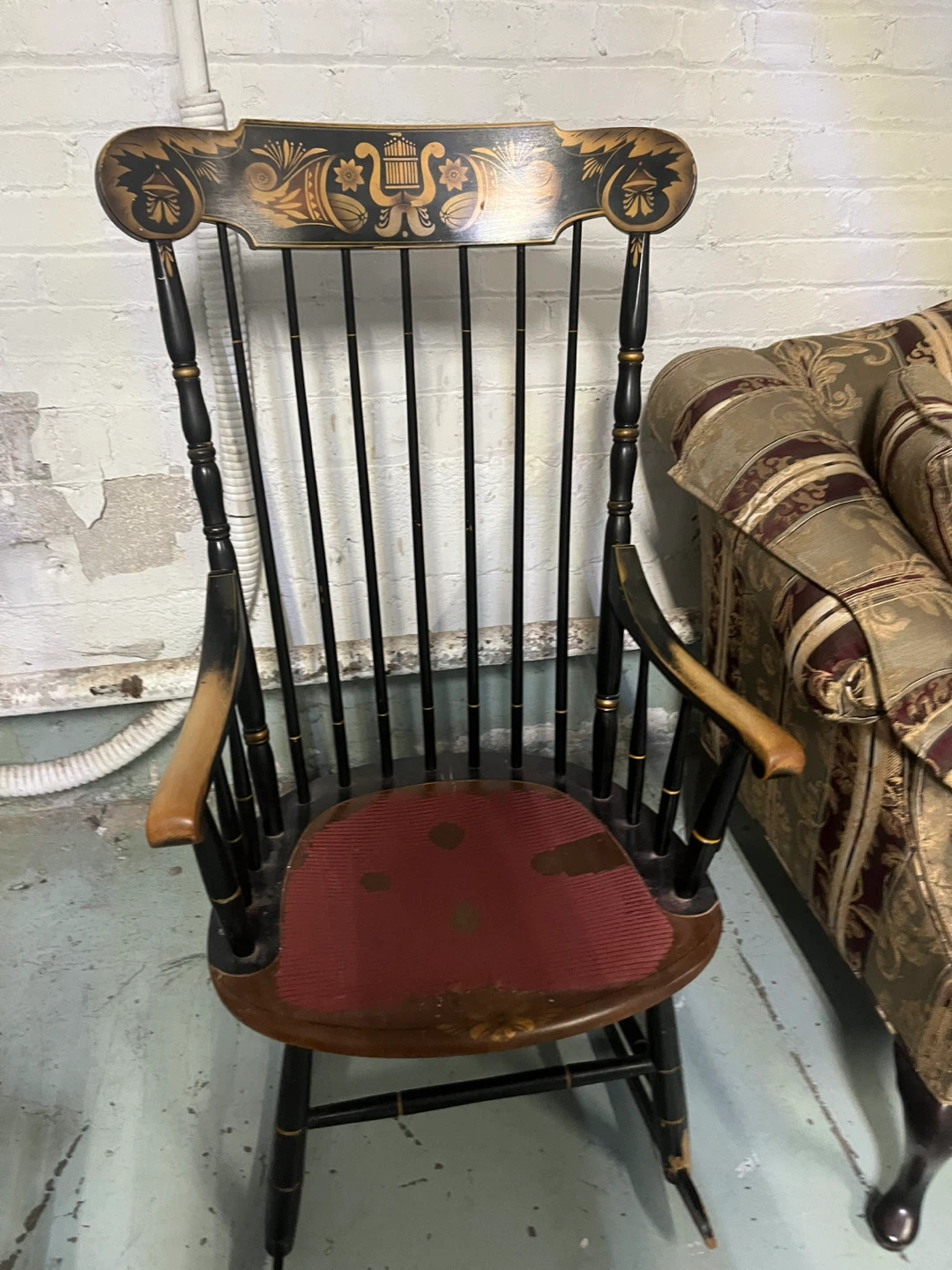 Antique Rocking Chair with Decorative Back