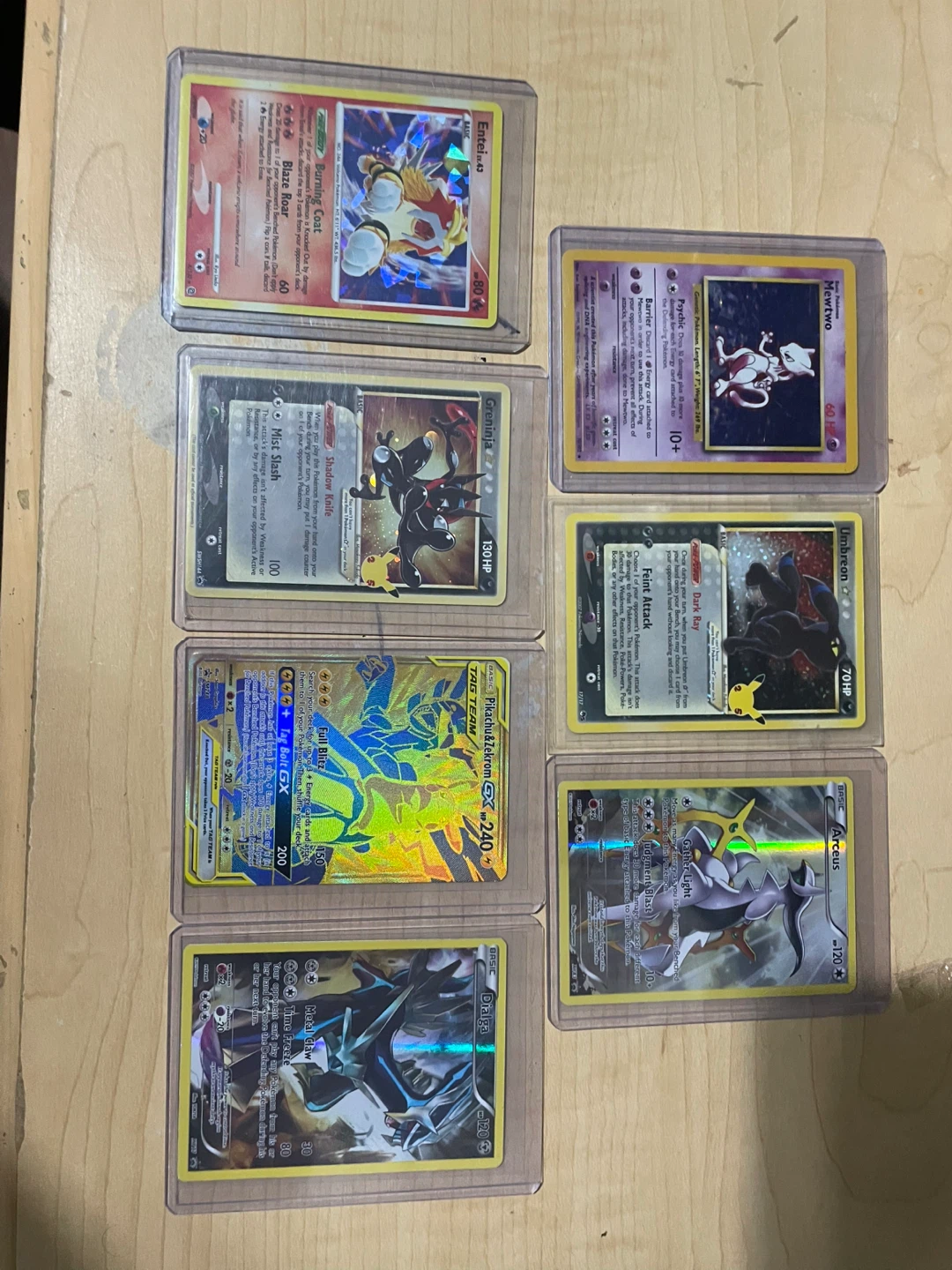 Lot of 7 gx, holo, and older pokemon card