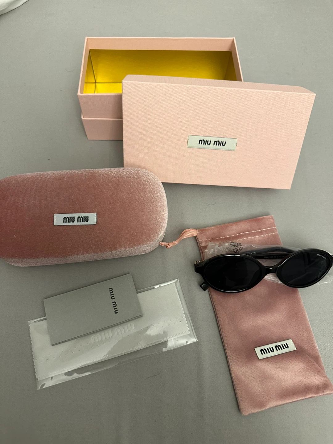 Miu Miu Logo-lettering Oval Sunglasses