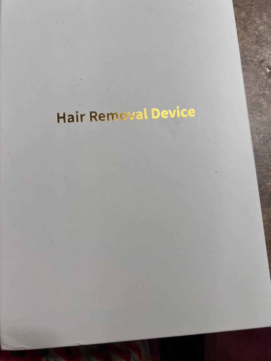 Hand-Held Hair Removal Device