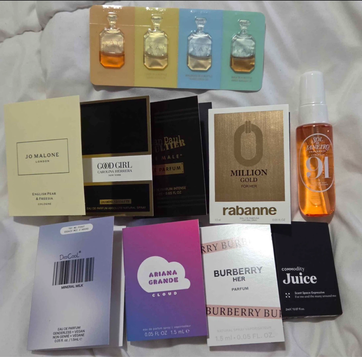 Assorted Designer Perfume Samples + 30ml SOL De Janeiro
