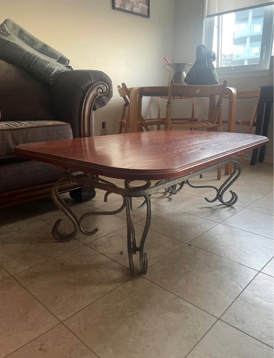 Wooden Coffee Table with Ornate Metal Base